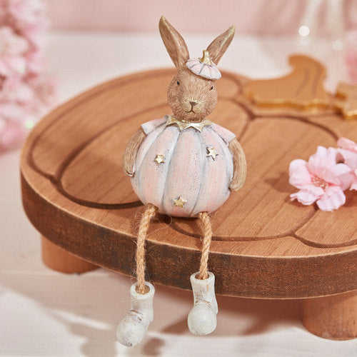 Decorative Shelf Sitting Rabbit Figurine Wearing Pastel Pink Halloween Inspired Autumn Pumpkin Outfit