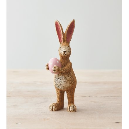 Standing Decorative Spring Rabbit Figure Holding Pink Easter Egg